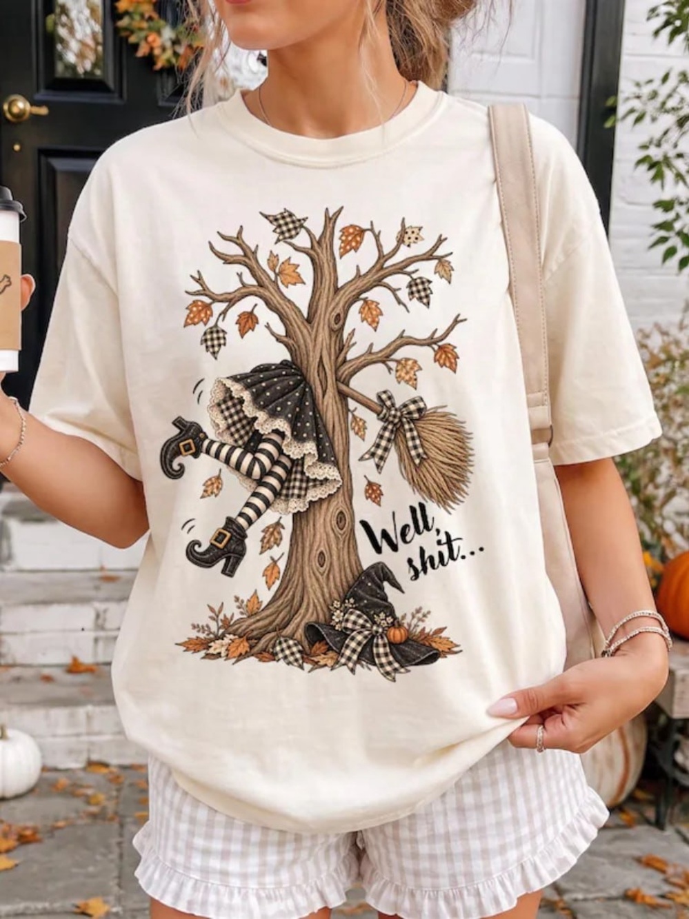 Cream Graphic Tee with Whimsical Witch Design